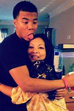 Kalif Raymond Parents Kim Ly & Eric Raymond |